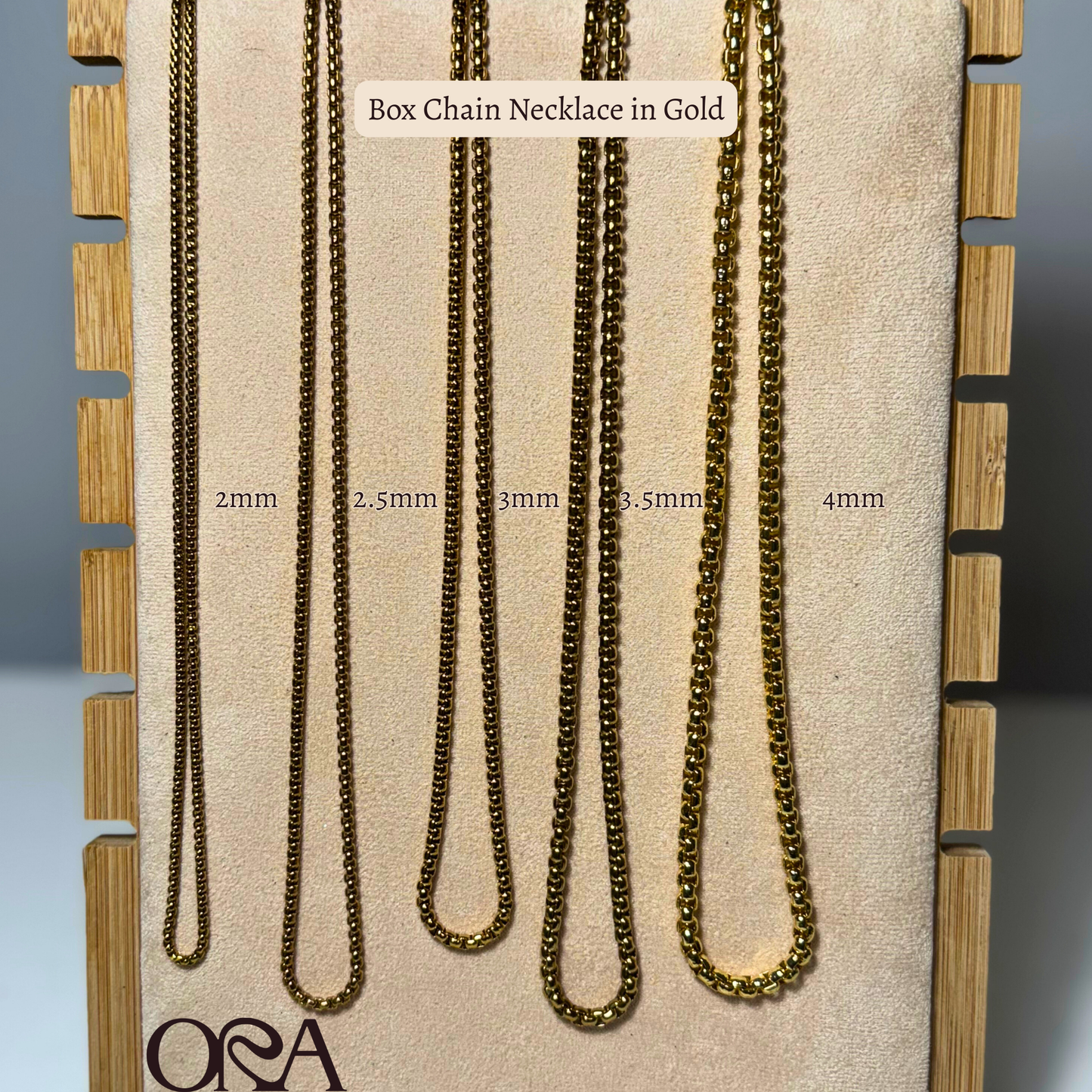 Box chain necklaces in gold on a display card with size measurements.