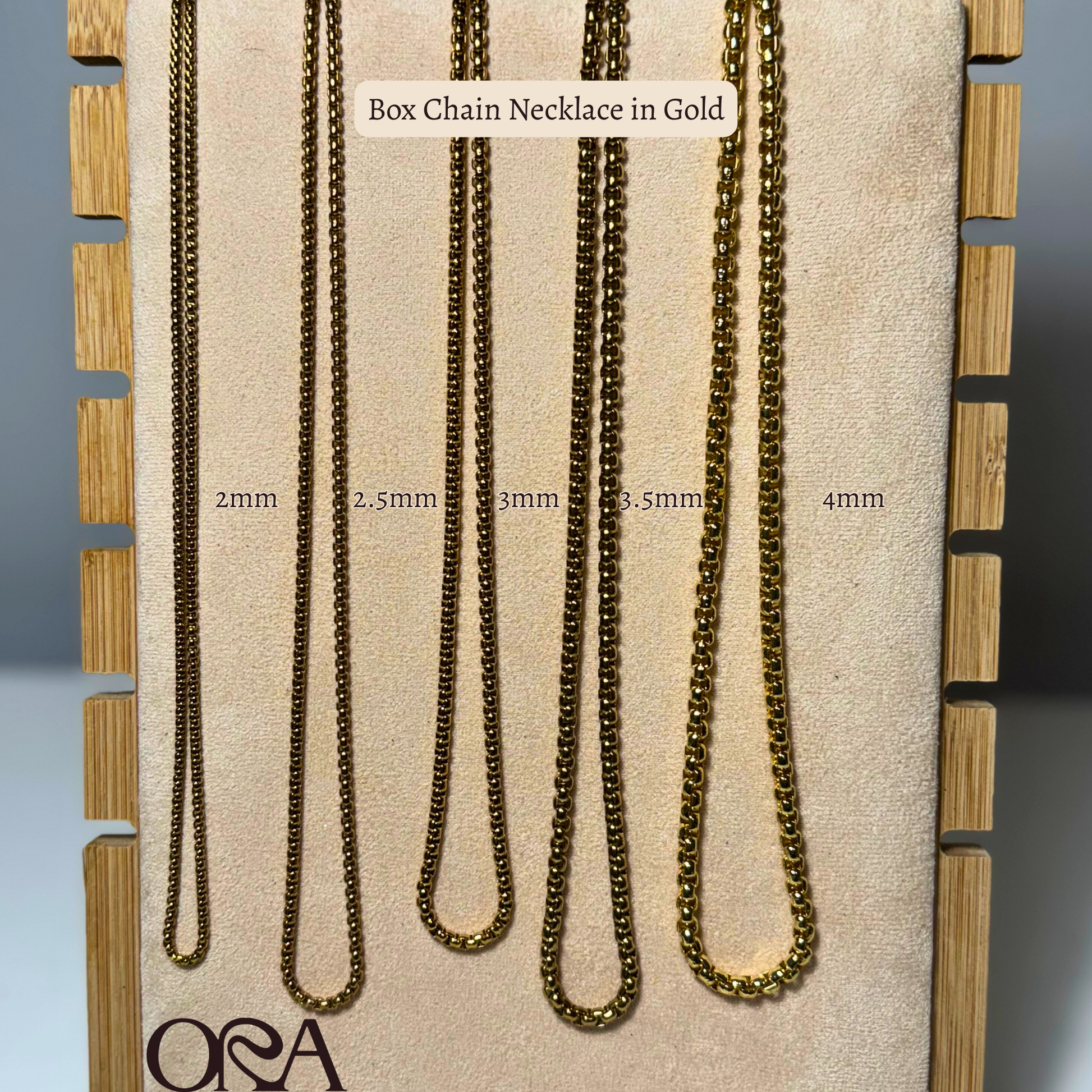 Box chain necklaces in gold on a display card with size measurements.
